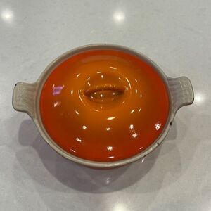 Le creuset vintage 7 in pan with lid. Flame color, add to your collection.